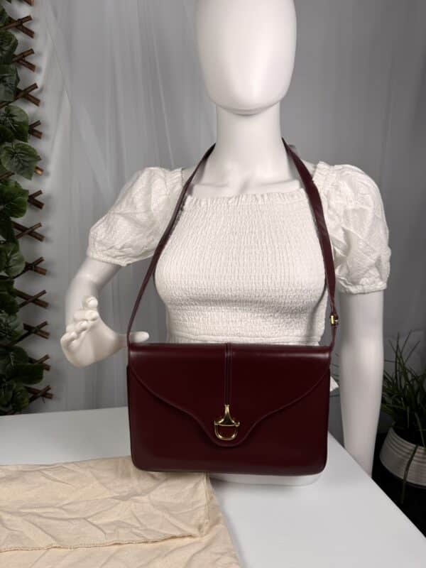 2026-06-25 15.16.46 Vintage Gucci Burgundy Leather Equestrian Stirrup Clasp Shoulder Bag