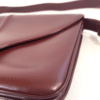 Screenshot 2026-02-06 083339 Vintage Gucci Burgundy Leather Equestrian Stirrup Clasp Shoulder Bag