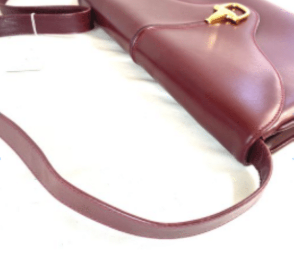 Screenshot 2026-02-06 083348 Vintage Gucci Burgundy Leather Equestrian Stirrup Clasp Shoulder Bag