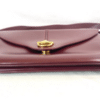 Screenshot 2026-02-06 083416 Vintage Gucci Burgundy Leather Equestrian Stirrup Clasp Shoulder Bag