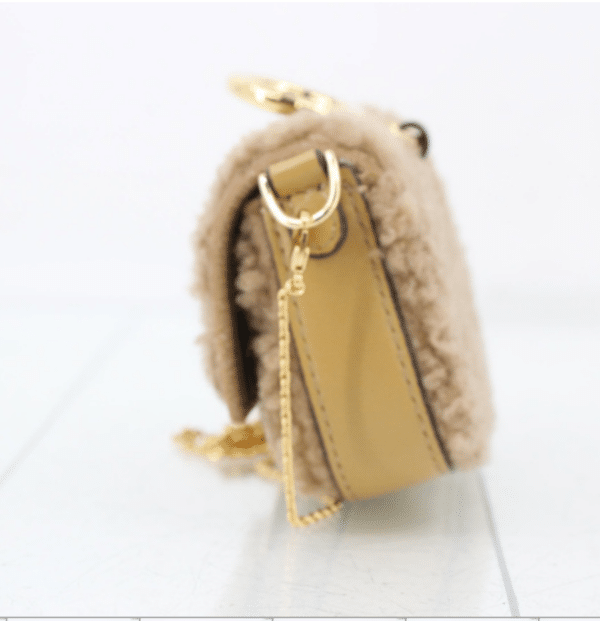 Screenshot 2026-02-24 070842 Fendi Nano Baguette Beige Shearling Gold Chain Crossbody Bag