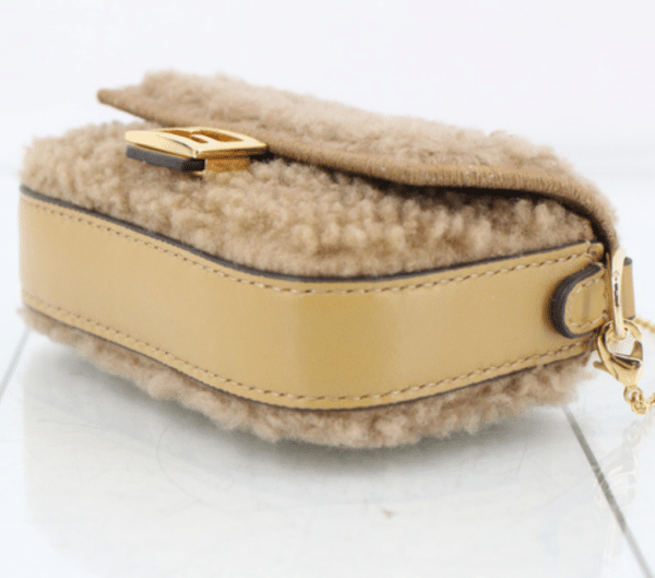 Screenshot 2026-02-24 070910 Fendi Nano Baguette Beige Shearling Gold Chain Crossbody Bag