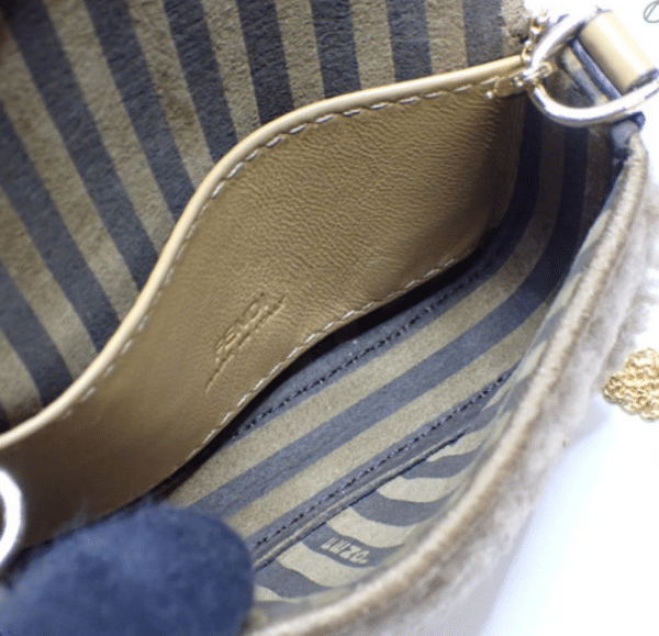 Screenshot 2026-02-24 070931 Fendi Nano Baguette Beige Shearling Gold Chain Crossbody Bag