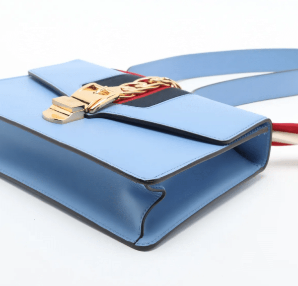 Screenshot 2026-03-07 094616 Gucci Sylvie Mini Light Blue Leather Web Chain Shoulder Bag 431666