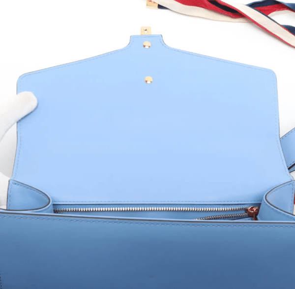 Screenshot 2026-03-07 094705 Gucci Sylvie Mini Light Blue Leather Web Chain Shoulder Bag 431666