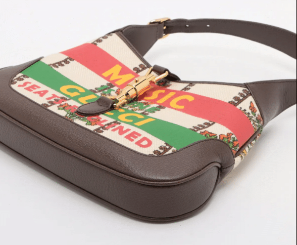 Screenshot 2026-03-13 215248 Gucci 100 Jackie 1961 Small Music Is Mine Canvas Hobo Bag 636706