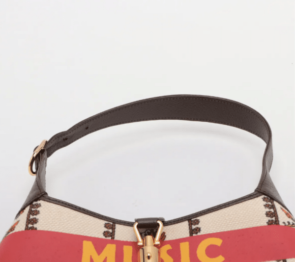 Screenshot 2026-03-13 215312 Gucci 100 Jackie 1961 Small Music Is Mine Canvas Hobo Bag 636706