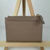 2026-04-26 15.30.09 Prada Beige Textured Leather Card Holder Zip Coin Case Gold Logo