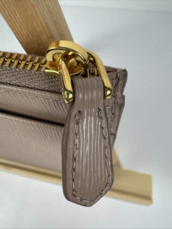 2026-04-26 15.30.17 Prada Beige Textured Leather Card Holder Zip Coin Case Gold Logo