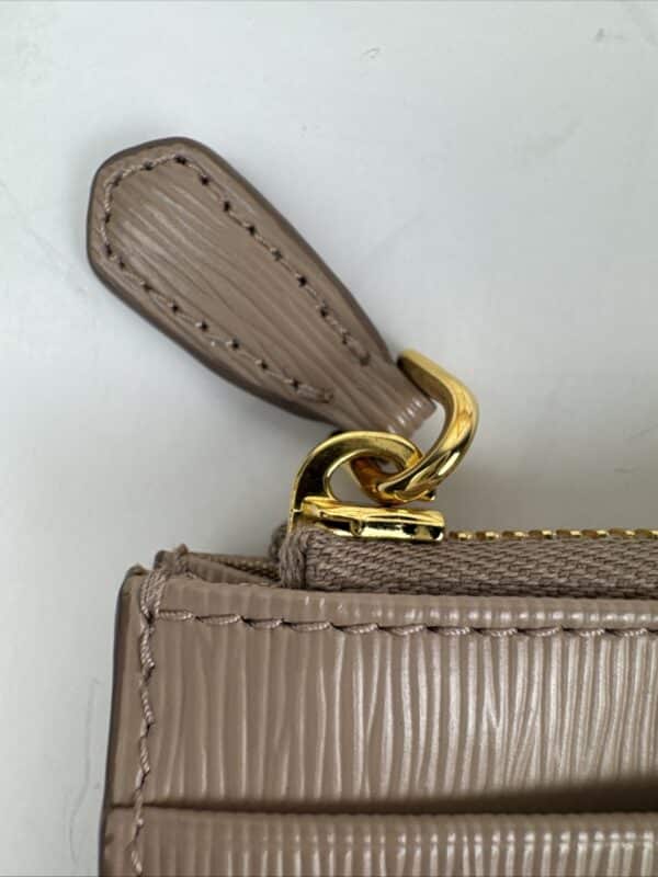 2026-04-26 15.30.39 Prada Beige Textured Leather Card Holder Zip Coin Case Gold Logo