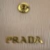 2026-04-26 15.44.11 Prada Beige Textured Leather Card Holder Zip Coin Case Gold Logo