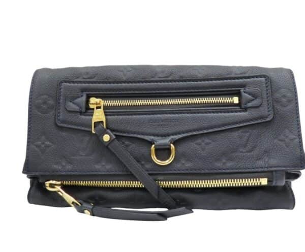 p1-238.jpg Louis Vuitton Pétillante Clutch in Bleu Infini Monogram Empreinte Leather, M93425