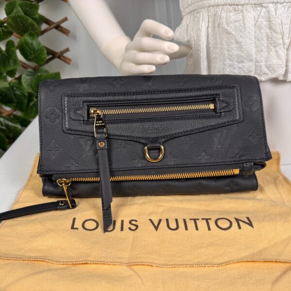 p1-241.jpg Louis Vuitton Pétillante Clutch in Bleu Infini Monogram Empreinte Leather, M93425