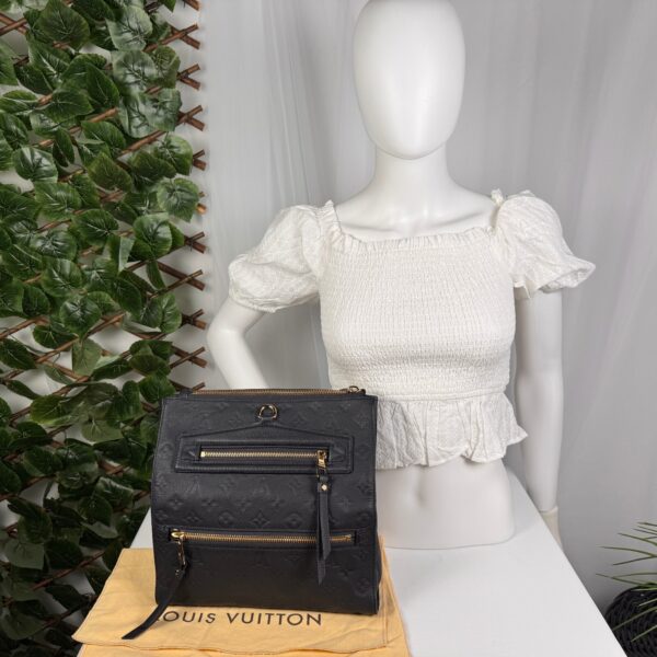 p1-243.jpg Louis Vuitton Pétillante Clutch in Bleu Infini Monogram Empreinte Leather, M93425