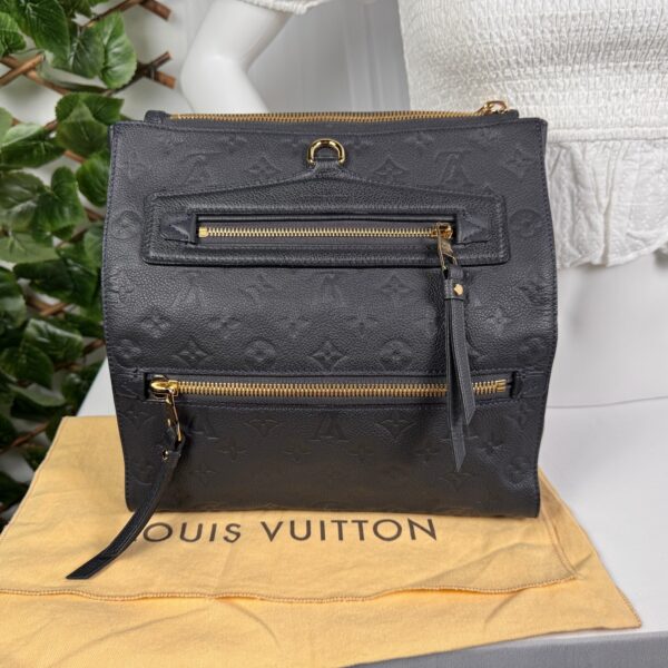 p1-244.jpg Louis Vuitton Pétillante Clutch in Bleu Infini Monogram Empreinte Leather, M93425