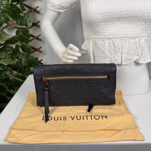 p1-246.jpg Louis Vuitton Pétillante Clutch in Bleu Infini Monogram Empreinte Leather, M93425
