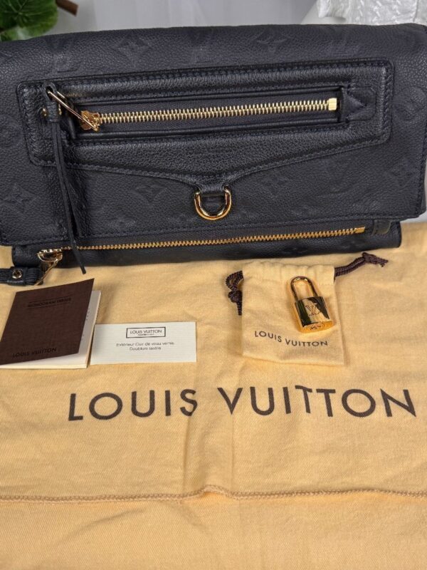 p1-248.jpg Louis Vuitton Pétillante Clutch in Bleu Infini Monogram Empreinte Leather, M93425