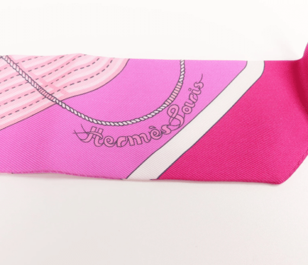 Screenshot 2026-08-30 161838 Hermès Twilly Silk Scarf – Pink, Red & Purple Geometric Equestrian Print