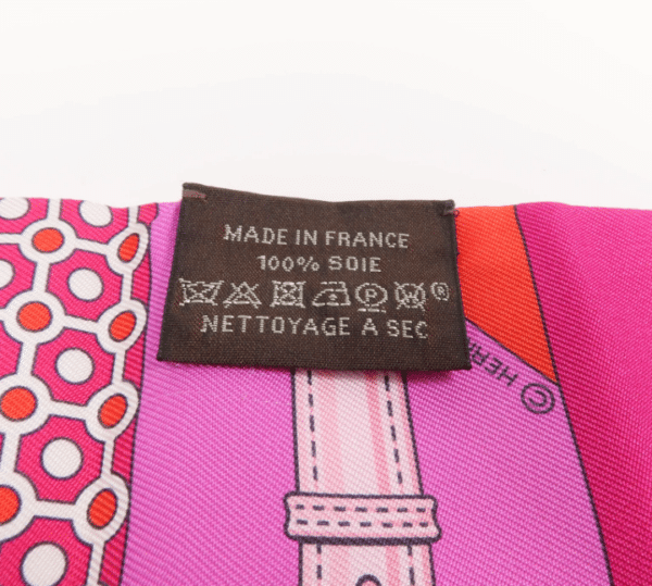 Screenshot 2026-08-30 161853 Hermès Twilly Silk Scarf – Pink, Red & Purple Geometric Equestrian Print