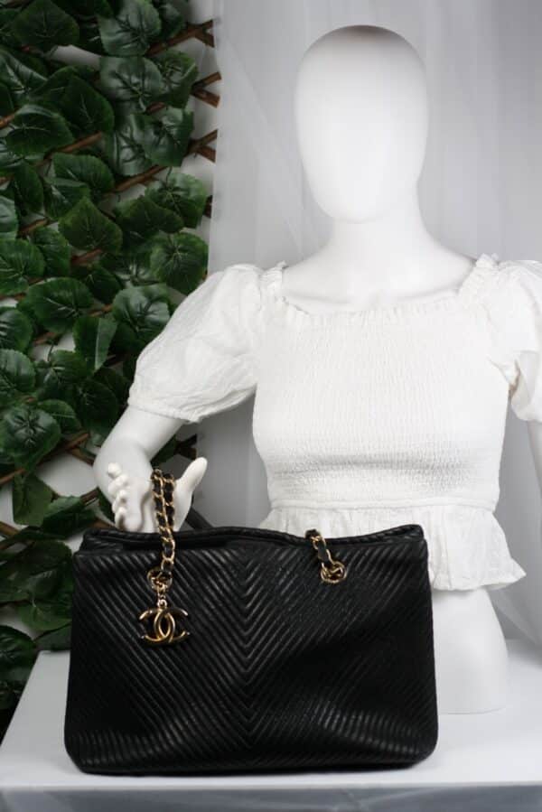 p1-224.jpg Chanel Surpique Chevron Calfskin CC Charm Black Leather Large Shopping Tote