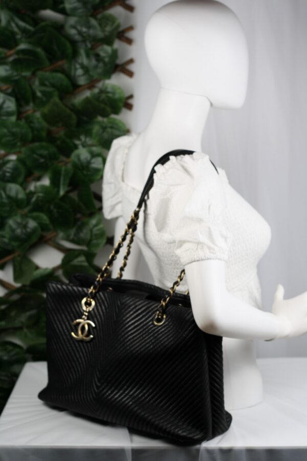 p1-226.jpg Chanel Surpique Chevron Calfskin CC Charm Black Leather Large Shopping Tote