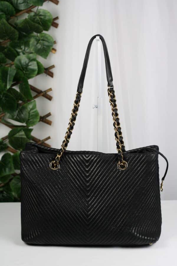 p1-227.jpg Chanel Surpique Chevron Calfskin CC Charm Black Leather Large Shopping Tote