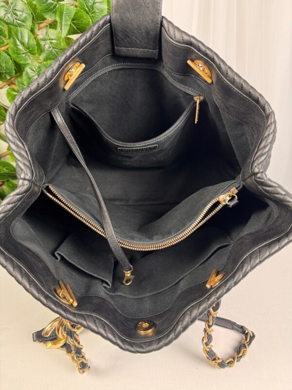 p1-228.jpg Chanel Surpique Chevron Calfskin CC Charm Black Leather Large Shopping Tote