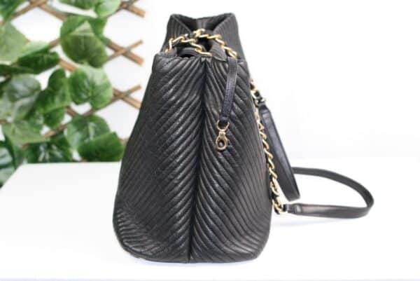p1-233.jpg Chanel Surpique Chevron Calfskin CC Charm Black Leather Large Shopping Tote