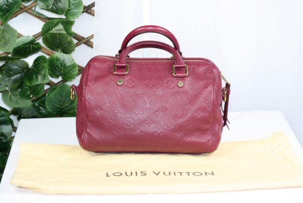 p1-278.jpg Louis Vuitton Speedy Bandoulière 30 Aurore Monogram Empreinte Leather Handbag