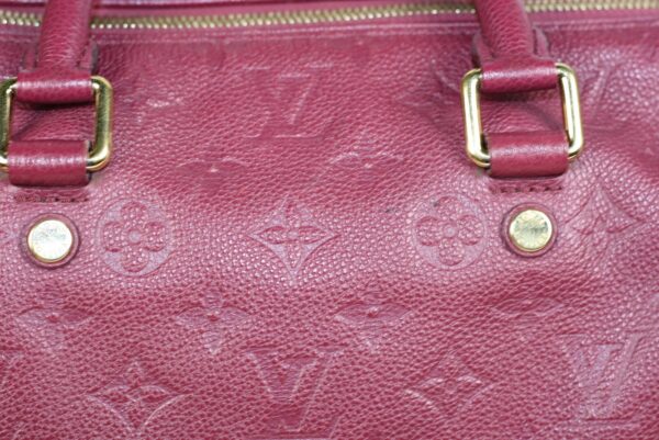 p1-279.jpg Louis Vuitton Speedy Bandoulière 30 Aurore Monogram Empreinte Leather Handbag
