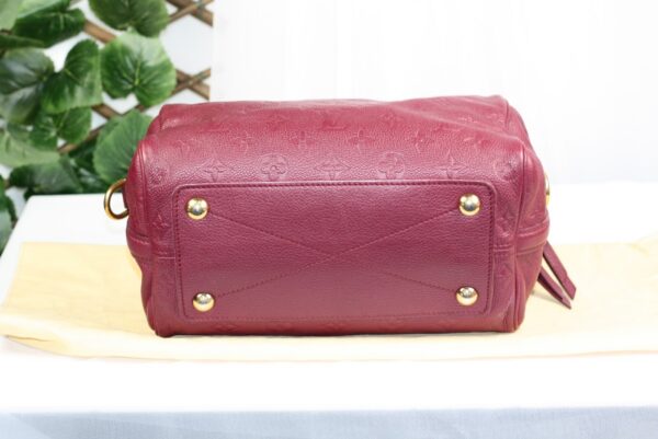 p1-280.jpg Louis Vuitton Speedy Bandoulière 30 Aurore Monogram Empreinte Leather Handbag