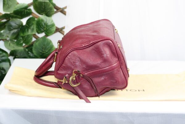 p1-282.jpg Louis Vuitton Speedy Bandoulière 30 Aurore Monogram Empreinte Leather Handbag
