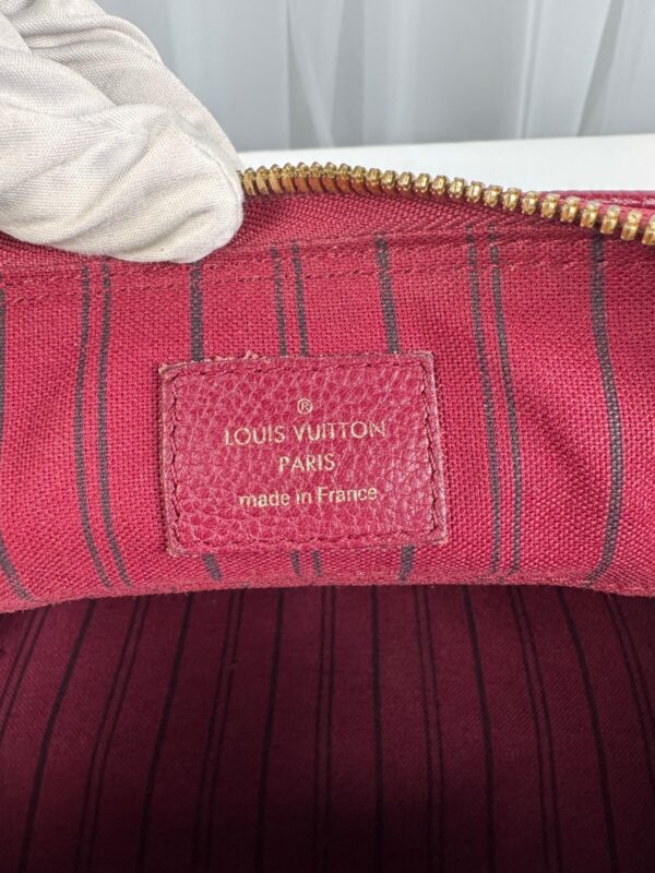 p1-287.jpg Louis Vuitton Speedy Bandoulière 30 Aurore Monogram Empreinte Leather Handbag
