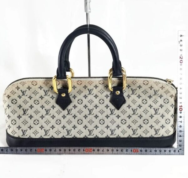 p1-18.jpg Louis Vuitton Mini Lin Alma Long Horizontal Monogram Handbag Navy